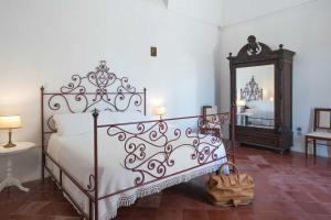Posteľ alebo postele v izbe v ubytovaní Castello di Casamassella
