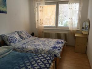 Postel nebo postele na pokoji v ubytování Lydiavi