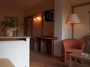 TV a/nebo společenská místnost v ubytování Hotel Catinaccio Rosengarten