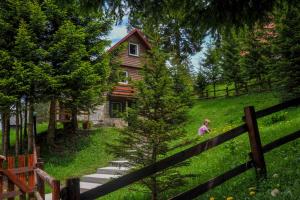 Zahrada ubytování Chalet Escapade with Sauna