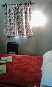 
Una cama o camas en una habitación de Residencial Marluc
