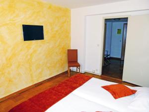 Posteľ alebo postele v izbe v ubytovaní Hostellerie du XVI Siècle