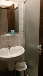 Koupelna v ubytování Ricci Rooms