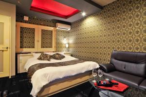 Ένα ή περισσότερα κρεβάτια σε δωμάτιο στο Hotel Sakura-saku (Adult Only)