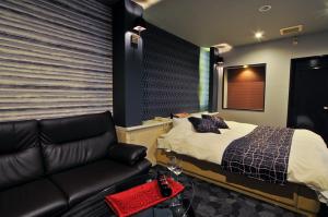 Ένα ή περισσότερα κρεβάτια σε δωμάτιο στο Hotel Sakura-saku (Adult Only)