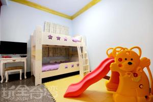 Postel nebo postele na pokoji v ubytování Shuanghu Garden B&B