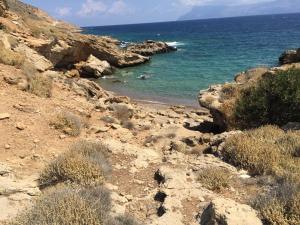 a view of the ocean from a rocky beach at MmeBassia in Chania