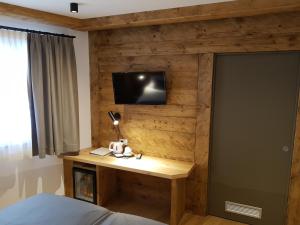 TV a/nebo společenská místnost v ubytování Hotel Vandot