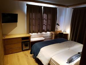 Postel nebo postele na pokoji v ubytování Hotel Vandot
