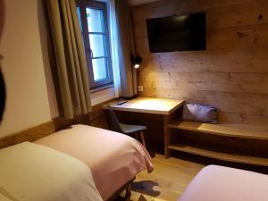 Postel nebo postele na pokoji v ubytování Hotel Vandot