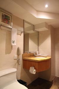 Vannituba majutusasutuses Yihe Hotel Ouzhuang