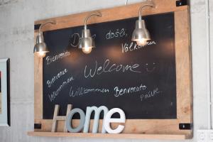 a chalkboard with the name of a home written on it at Belado Residence Bol in Bol