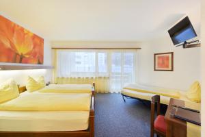 Voodi või voodid majutusasutuse Schlosshotel - Self Check-In Hotel toas