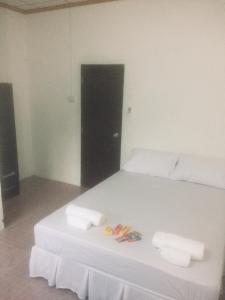 Postel nebo postele na pokoji v ubytování Hero Phuket