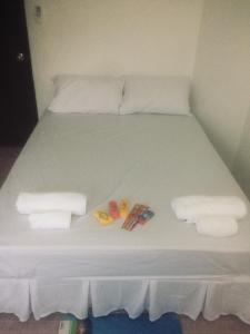 Postel nebo postele na pokoji v ubytování Hero Phuket