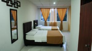 מיטה או מיטות בחדר ב-Hotel Parque del Perro