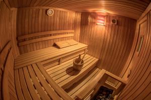an overhead view of a wooden sauna with a bench at Mountain Living Apartments in San Valentino alla Muta