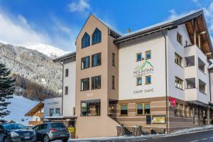 Nespecifikovaný výhled na hory nebo výhled na hory při pohledu z aparthotelu