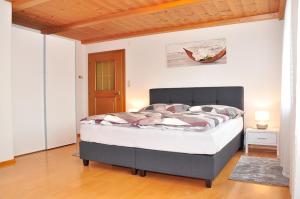Ένα ή περισσότερα κρεβάτια σε δωμάτιο στο Ferienwohnung Vera
