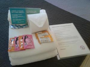 a white envelope with a note and a box at Complejo Oceanico in Punta Del Diablo