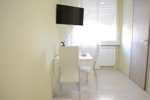 TV a/nebo společenská místnost v ubytování Casa Aurora B&B