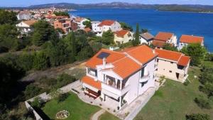 an aerial view of a house with an orange roof at Apartments Nada in Betina