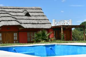The swimming pool at or close to Cabañas Villa Lounge