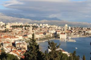 a view of a city with a body of water at Apartments Blue Maris Žnjan in Split