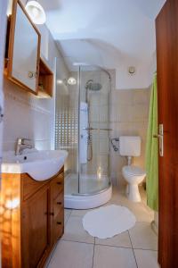 Koupelna v ubytování Hotel Skalinada