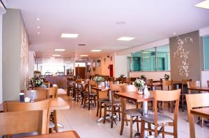 A restaurant or other place to eat at Unico Apart Hotel