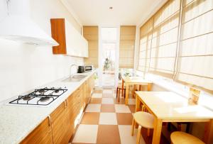 Kuchyňa alebo kuchynka v ubytovaní AMIGO Tuapse