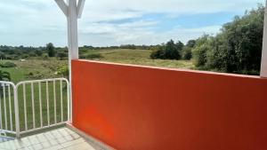 a view from the balcony of a house at Habitation Fouyapen II in Sainte-Anne