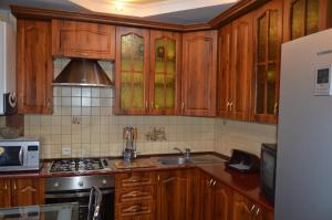 Кухня або міні-кухня у Lupova Home
