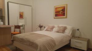 Postel nebo postele na pokoji v ubytování Zagreb Centre Apartments