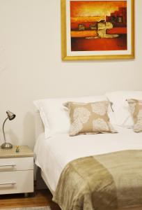 Postel nebo postele na pokoji v ubytování Zagreb Centre Apartments