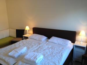 Tempat tidur dalam kamar di Appartements Buesum FW20