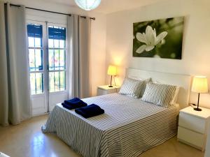 Posteľ alebo postele v izbe v ubytovaní Adosado en residencial