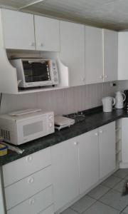 Η κουζίνα ή μικρή κουζίνα στο Hostería Alemana +16 φωτογραφίες