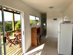 Η κουζίνα ή μικρή κουζίνα στο Mahalo Aparts