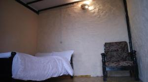 Postelja oz. postelje v sobi nastanitve Peace Guest House