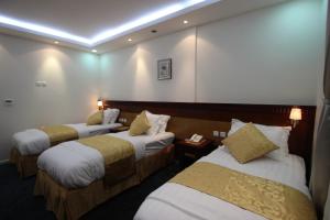 Postel nebo postele na pokoji v ubytování Al Adl Jewel Hotel + 31 fotografií