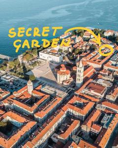 an aerial view of a city with the words secret garden at Secret Garden Apartment in Zadar