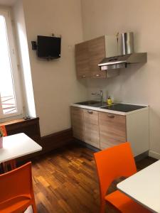 a kitchen with a sink and a counter top at Casa Bella Pantheon in Rome