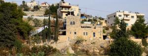 an old building on the side of a mountain at Hosh Al Subbar in Bethlehem