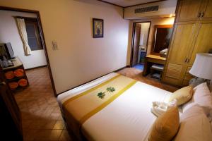 a bedroom with a large bed in a room at Smile House - Fisherman Village in Bophut