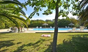 The swimming pool at or near Domaine Valdaronu