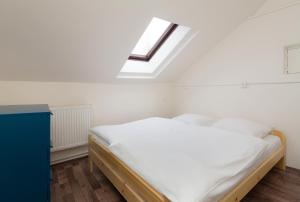 Posteľ alebo postele v izbe v ubytovaní Easy Housing