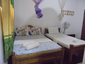 Postel nebo postele na pokoji v ubytování Ath Hala Safari Resort