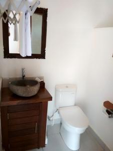 Een badkamer bij Amaya Cottage Ubud by SHM