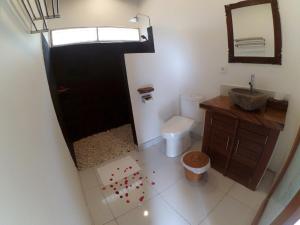 Een badkamer bij Amaya Cottage Ubud by SHM